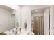 Modern bathroom offers a double-sink vanity and a shower and tub combo at 3090 Ora Smith Rd, Lincolnton, NC 28092