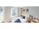 Stylish bedroom features a comfortable bed, natural light, and tasteful decor at 3090 Ora Smith Rd, Lincolnton, NC 28092