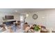 Living and dining area with a modern table set, and views to the kitchen and backyard at 3090 Ora Smith Rd, Lincolnton, NC 28092