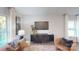 Well-lit living room showcases modern decor, a sleek TV, and comfortable seating at 3090 Ora Smith Rd, Lincolnton, NC 28092