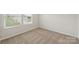 Small bedroom featuring carpeted flooring, bright natural light, and neutral wall paint at 3107 Riker St, Clover, SC 29710