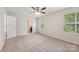 Bedroom featuring plush carpet floors and large windows that provide views of nature at 3107 Riker St, Clover, SC 29710