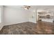 Spacious living room with hardwood floors, seamlessly connected to the adjacent kitchen and dining area at 3107 Riker St, Clover, SC 29710