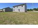 Exterior of home with large grassy backyard at 323 J C Dellinger Rd, Cherryville, NC 28021