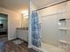 Well-lit bathroom boasts a vanity, shower, and modern fixtures for a comfortable experience at 323 J C Dellinger Rd, Cherryville, NC 28021
