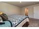 A warm bedroom features a luxurious bed and lots of space for your furnishings at 323 J C Dellinger Rd, Cherryville, NC 28021