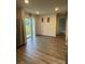 Dining area features sliding glass doors and wood-look flooring at 323 J C Dellinger Rd, Cherryville, NC 28021