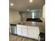 Kitchen area features granite countertops, stainless steel appliances, and an eat-in bar at 323 J C Dellinger Rd, Cherryville, NC 28021