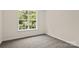 This is a naturally well lit bedroom with a large window and neutral walls at 3429 Lazy Day Ln, Charlotte, NC 28269
