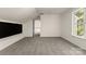 This is a large bonus room with neutral walls, carpet flooring and is naturally well lit at 3429 Lazy Day Ln, Charlotte, NC 28269
