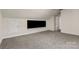 This is a large bonus room with neutral walls, carpet flooring and is naturally well lit at 3429 Lazy Day Ln, Charlotte, NC 28269