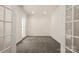 Cozy living room with carpet and French doors at 3429 Lazy Day Ln, Charlotte, NC 28269