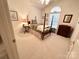 Cozy bedroom featuring a classic four-poster bed, soft lighting, and neutral carpeting at 35 Wittenburg Springs Dr, Taylorsville, NC 28681