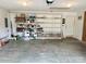 Spacious garage with built-in shelving for ample storage and organization at 35 Wittenburg Springs Dr, Taylorsville, NC 28681