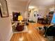 Open-concept living room with hardwood floors and natural light at 35 Wittenburg Springs Dr, Taylorsville, NC 28681