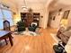 Inviting living room with hardwood floors, columns, a large window, and comfortable seating at 35 Wittenburg Springs Dr, Taylorsville, NC 28681