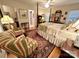 Spacious bedroom with a four poster bed, area rug, and ample natural light at 35 Wittenburg Springs Dr, Taylorsville, NC 28681