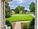 View of the neighborhood and street from the front porch at 35 Wittenburg Springs Dr, Taylorsville, NC 28681