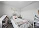 Bedroom showcases a study desk and bookshelves, fostering a creative space at 3951 Tersk Dr, Midland, NC 28107