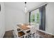 Bright dining room features wood table with seating for six and chandelier lighting at 3951 Tersk Dr, Midland, NC 28107
