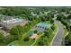 Aerial view featuring the community's tennis courts and playground nestled in a green, landscaped area at 4797 Chesney Nw St, Concord, NC 28027