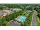 An aerial view of the community's pool, surrounded by lush trees and landscaping at 4797 Chesney Nw St, Concord, NC 28027