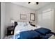 Bedroom featuring neutral decor, window, and closet with white doors at 4797 Chesney Nw St, Concord, NC 28027