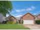 Charming brick home featuring a well-manicured lawn and a two-car garage at 4797 Chesney Nw St, Concord, NC 28027