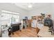 Bright bedroom space with a large window and wood floors at 502 Roxanne Nw Ct, Concord, NC 28027