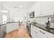 Modern kitchen with granite countertops and stainless steel appliances at 502 Roxanne Nw Ct, Concord, NC 28027
