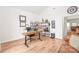 Bright office space with wood floors, built-in shelving, and a comfortable workspace at 502 Roxanne Nw Ct, Concord, NC 28027