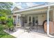 Inviting covered patio featuring an outdoor dining table and ample space for relaxation at 502 Roxanne Nw Ct, Concord, NC 28027