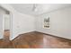 Bedroom featuring hardwood floors, neutral walls, and a window view at 505 Franklin Ave, Shelby, NC 28150