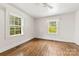 Bright, spacious bedroom with hardwood floors and two windows at 505 Franklin Ave, Shelby, NC 28150