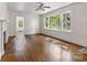 Inviting living area with large windows, natural light, and wood floors at 505 Franklin Ave, Shelby, NC 28150