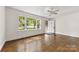 Spacious living room with a ceiling fan and hardwood floors at 505 Franklin Ave, Shelby, NC 28150