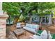 Inviting backyard featuring comfortable outdoor seating and lush landscaping at 506 Clement Ave, Charlotte, NC 28204