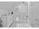 Bright bathroom featuring sleek subway tile and black and white floors at 506 Clement Ave, Charlotte, NC 28204