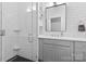 Elegant bathroom featuring subway tile, glass shower, and stylish vanity at 506 Clement Ave, Charlotte, NC 28204