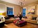 Bright living room featuring neutral walls, hardwood floors, and modern lighting at 506 Clement Ave, Charlotte, NC 28204