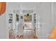 Well-organized laundry room with built-in storage, a washer, and natural light, providing a practical and efficient space at 514 Wood St, Troy, NC 27371