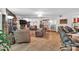 Open-concept living room with exposed brick, comfortable seating, and seamless flow for modern living at 514 Wood St, Troy, NC 27371