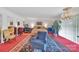 Large main bedroom with a comfortable sitting area, natural light, and open floor plan at 514 Wood St, Troy, NC 27371