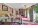 Main bedroom with outdoor views, custom bookcase, and large bed at 514 Wood St, Troy, NC 27371