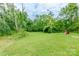 Expansive backyard with lush green grass, perfect for outdoor activities and relaxation at 515 Myrtle Ave, Chester, SC 29706