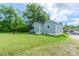 Charming home with a well-maintained lawn and backyard area, offering a private outdoor space at 515 Myrtle Ave, Chester, SC 29706
