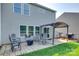 Cozy backyard features a patio, pergola and a lush lawn, perfect for outdoor relaxation at 5228 Tomsie Efird Ln, Charlotte, NC 28269