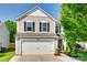 Charming two-story home featuring a two-car garage and neutral siding at 5228 Tomsie Efird Ln, Charlotte, NC 28269