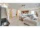 Open-concept living area with stairs, seamlessly connecting to the kitchen and dining spaces at 5228 Tomsie Efird Ln, Charlotte, NC 28269