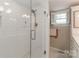 Modern bathroom with glass shower, and white subway tile at 536 Carroll St, Statesville, NC 28625